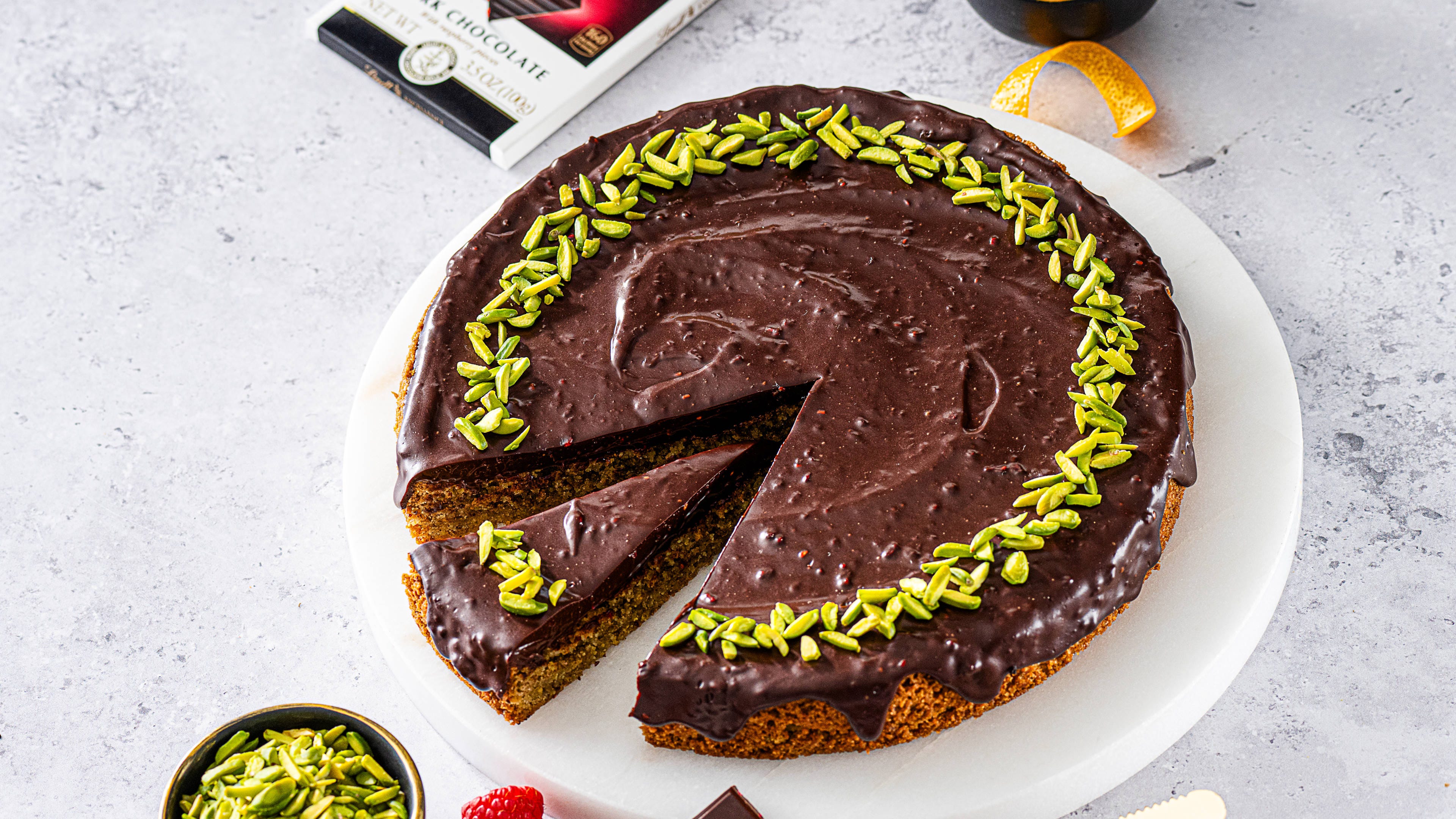 Pistachio Flourless Cake with Raspberry Dark Chocolate Ganache